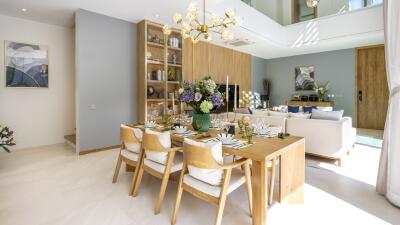 Modern living room and dining area with elegant decor