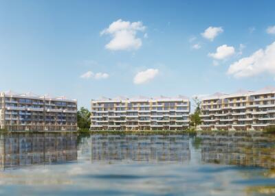 Exterior view of apartment buildings with reflection in water