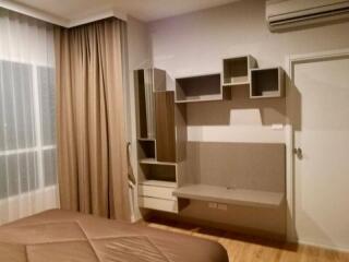 Bedroom with modern furnishings and air conditioning