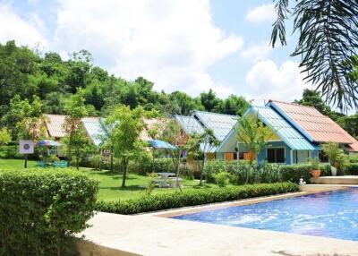 Outdoor view of houses with garden and swimming pool