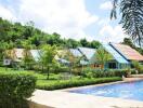 Outdoor view of houses with garden and swimming pool