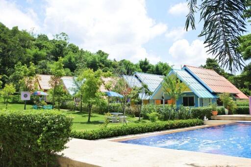 Outdoor view of houses with garden and swimming pool