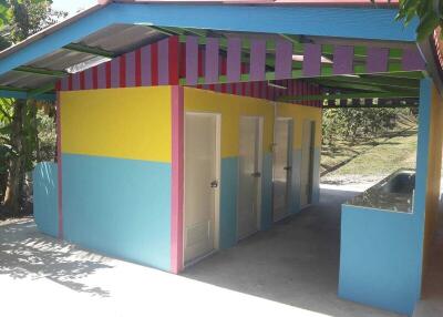 Colorful outdoor facility with individual rooms