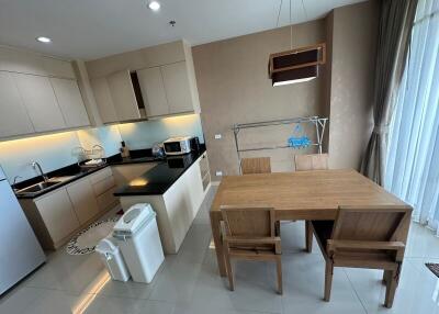 Modern kitchen with dining area and appliances