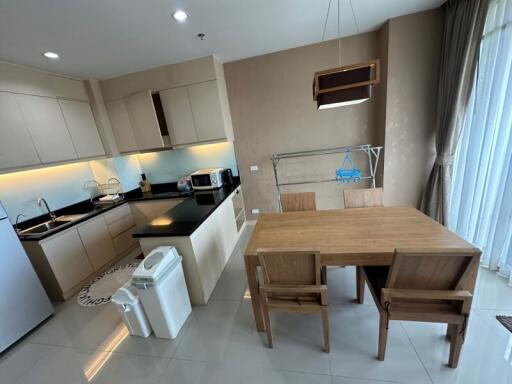 Modern kitchen with dining area and appliances