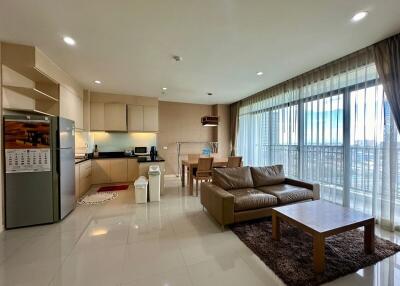 Modern living area with kitchen and dining space