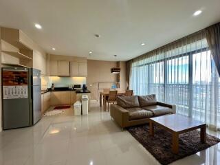 Modern living area with kitchen and dining space