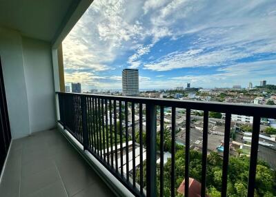 Balcony view with railings overlooking the cityscape