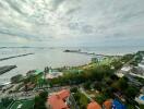 View from building overlooking the sea with a picturesque coastline and distant horizon