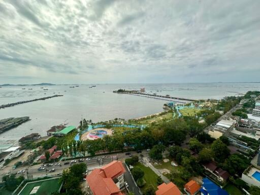 View from building overlooking the sea with a picturesque coastline and distant horizon