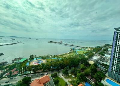 Aerial view of coastal area with buildings and waterfront