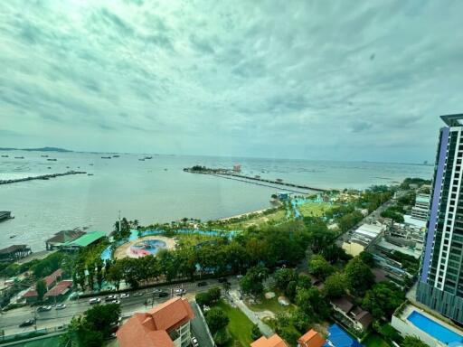 Aerial view of coastal area with buildings and waterfront