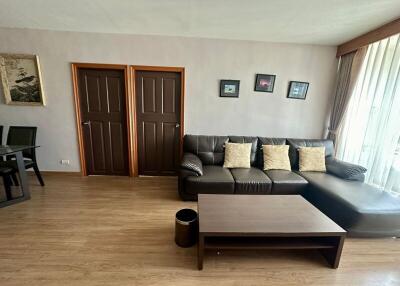 Modern living room with brown sofa and coffee table