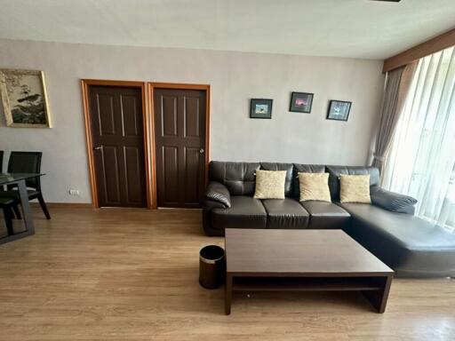 Modern living room with brown sofa and coffee table