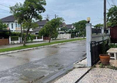 View of quiet residential street from the front of a property