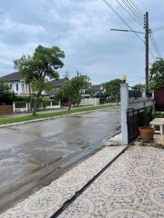 View of quiet residential street from the front of a property