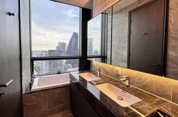 Modern bathroom with city view from the window