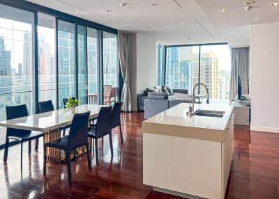 Modern open-plan living area with kitchen and dining space