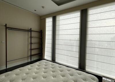 Spacious bedroom with large windows