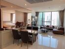 Modern living and dining area with city view