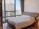 Spacious bedroom with city view