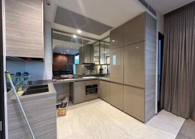 Modern kitchen with sleek cabinets and stainless steel appliances