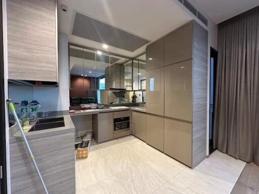 Modern kitchen with sleek cabinets and stainless steel appliances