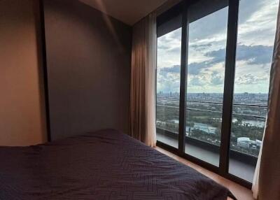 Bedroom with a large window view