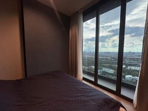 Bedroom with a large window view