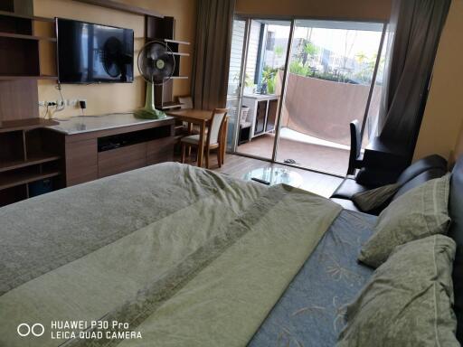 Spacious bedroom with direct balcony access