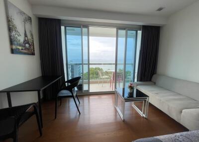 Living area with balcony and ocean view