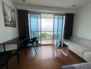 Living area with balcony and ocean view