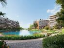 View of modern residential buildings with a central lake and landscaped greenery