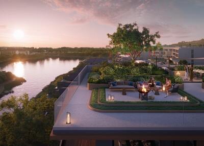 Rooftop terrace with seating area and fire pit at sunset