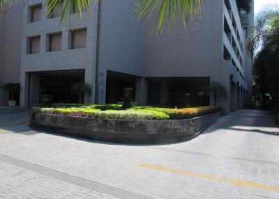 Exterior view of a building with landscaped greenery