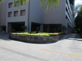 Exterior view of a building with landscaped greenery