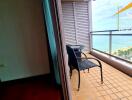 Balcony with sea view and two chairs