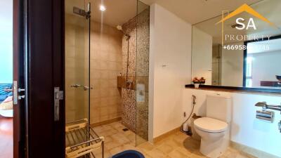 Modern bathroom with glass shower and toilet