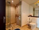 Modern bathroom with glass shower and toilet