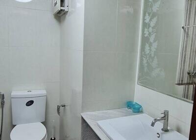 Modern bathroom with sink and toilet