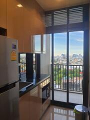 Modern kitchen with balcony view