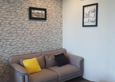 Living room with sofa and wall decor