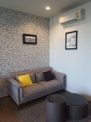 Living room with sofa and wall decor