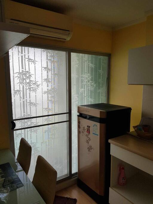 Modern kitchen with frosted glass door