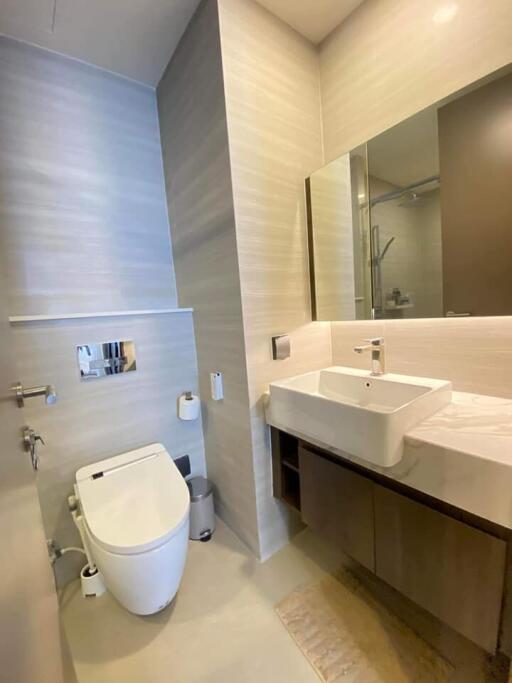 Modern bathroom with sink and toilet