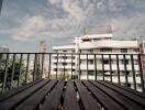 Balcony with a view of buildings and sky