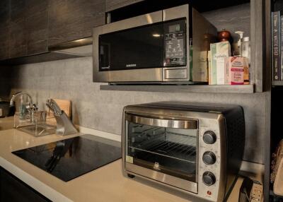 Modern kitchen with microwave and oven