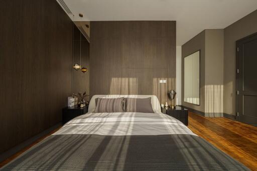 Modern bedroom with wooden flooring and accent wall