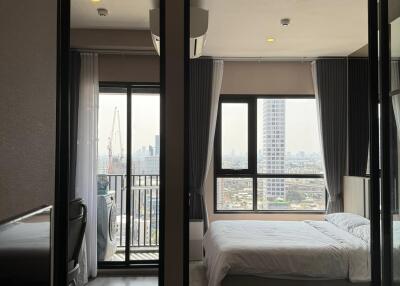 Modern bedroom with a city view