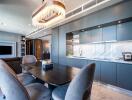 Modern kitchen with dining table and chandelier